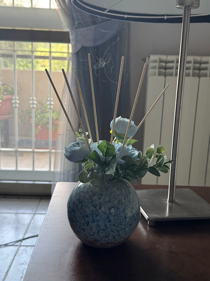 Profumatore per ambienti decorato con fiori artificiali di ottima qualità