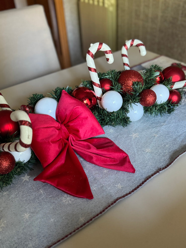 Tralcio centrotavola bianco e rosso con fiocco e maxi candycane