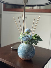 Profumatore per ambienti decorato con fiori artificiali di ottima qualità