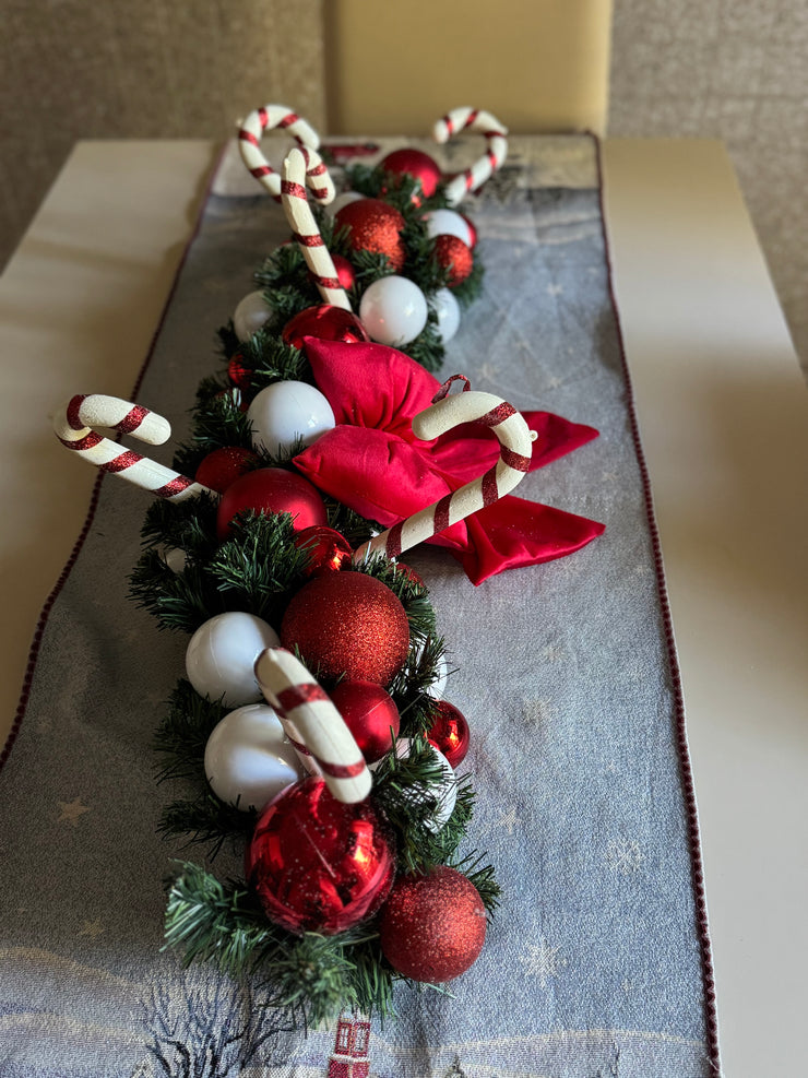 Tralcio centrotavola bianco e rosso con fiocco e maxi candycane